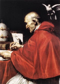 Painting of Pope Gregory the Great writing at a desk wearing a shiny red cape.